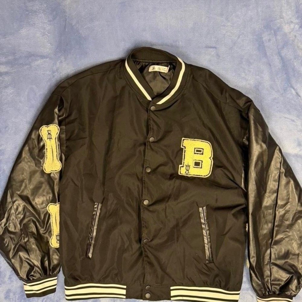 Black varsity jacket with yellow accents men size L